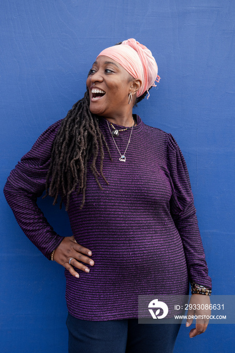 Portrait of beautiful woman with dreadlocks wearing turban