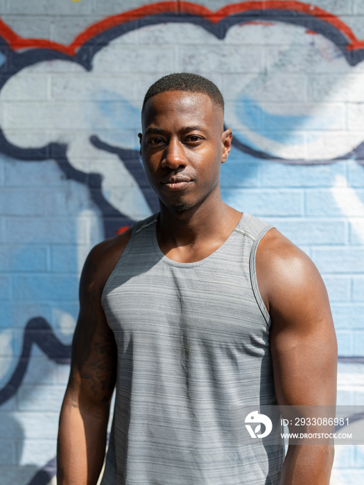 Portrait of muscular man in sports clothing