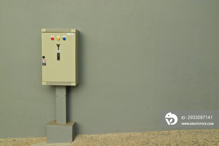 Outdoor electrical switchboard controls on the wall. Technology and safety concept.