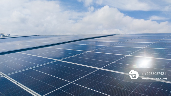 Solar Panel Installed on  industrial building roof with solar roof reflection.