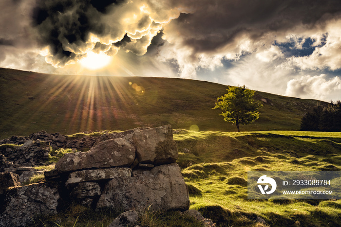 Let there be light, a dramatic sunset on a mountain in South Wales