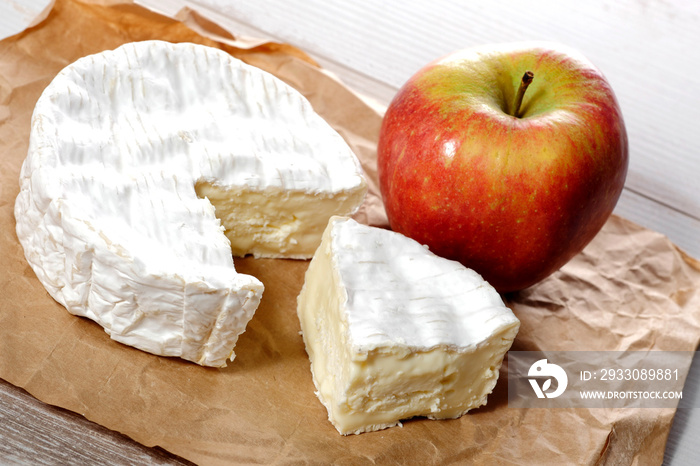 camembert of Normandie with red apple