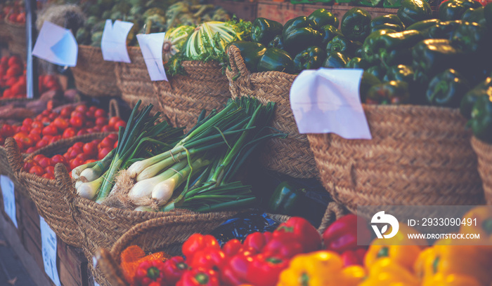 Organic vegetable stall at a farmer’s market and selling fresh vegetables from garden. Local produce at the summer farmers market in the city.