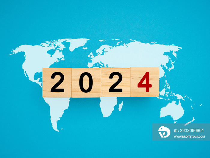 Business planning and countdown to 2024 with the letters 2024 with the world map on a blue background