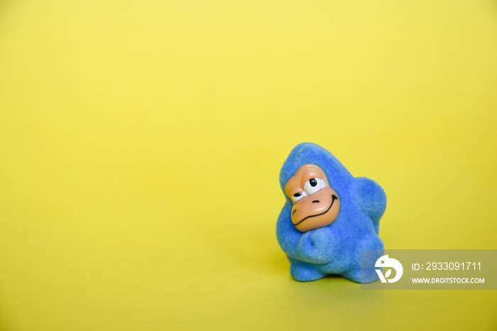 blue toy yeti, place for space, blue toy monkey, gorilla