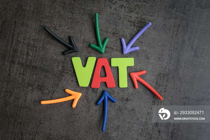 Important of VAT, tax in buy and sell business, colorful arrows pointing to the word VAT at the center on black cement wall, financial income have to pay government tax by law