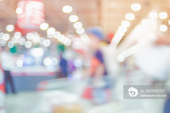 Blurred background of customer shopping at supermarket store blur background with bokeh