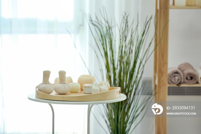 Beautiful spa composition on table in modern wellness center