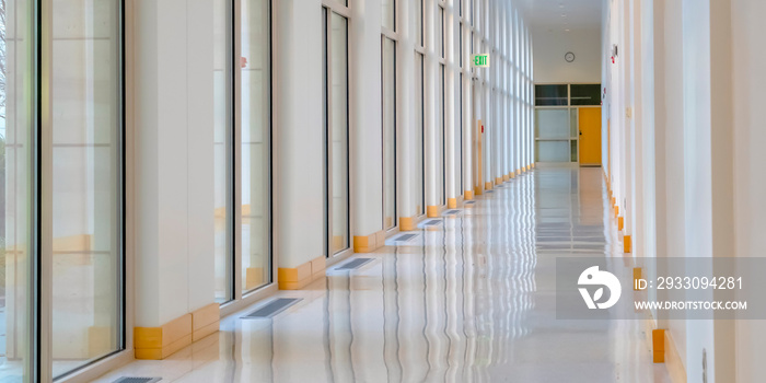 Sunlight streaming inside the hallway of building