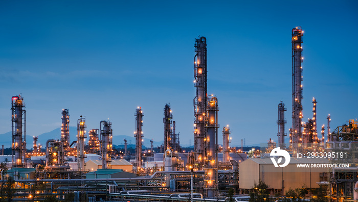 Oil and gas refinery plant or petrochemical industry on blue sky twilight background, Manufacturing petroleum industrial
