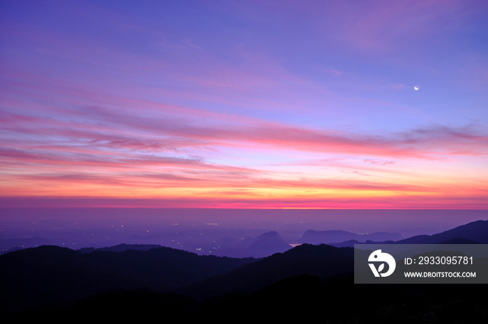 Twilight light pink and purple colors beautifully. reflect the views Mountains and fog in the morning. Khao Jed Yod, Trang in Thailand.