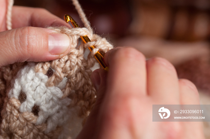 Woman hands knitting crochet.Crochet hook