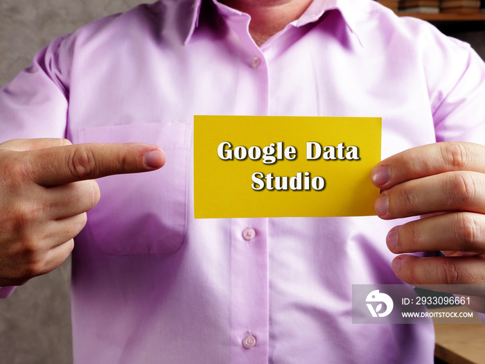 Financial concept about Google Data Studio with inscription on the piece of paper.