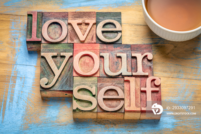 love yourself word abstract in wood type, self respect concept