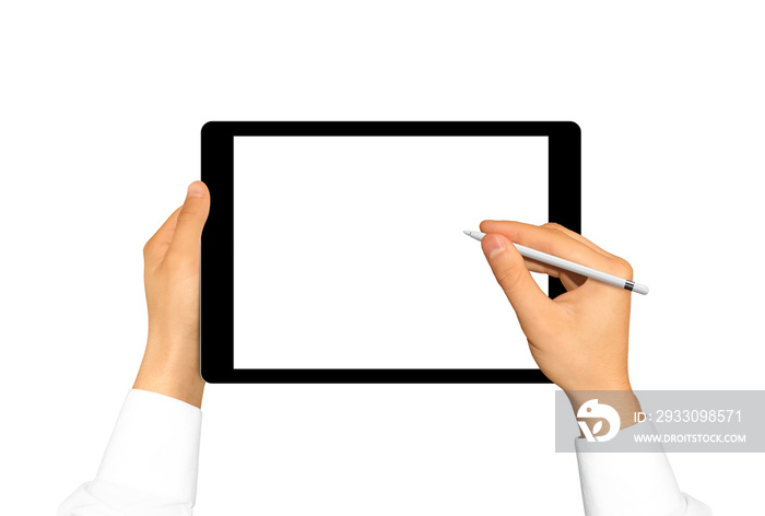 Hand holding stylus near graphic tablet blank screen. Empty tab display mock up isolated. Designer drawing, painting, sketching. New digitizer pencil presentation. Black tablet touchscreen mockup.