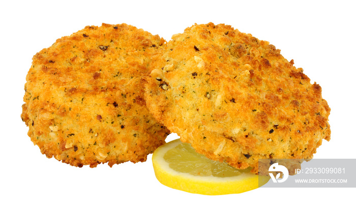 Breadcrumb covered salmon fish cakes isolated on a white background