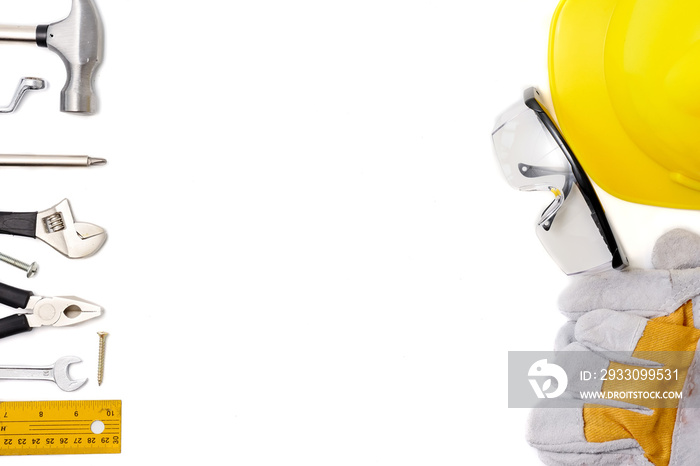 Construction safety equipment and tools on white background. Free space for text