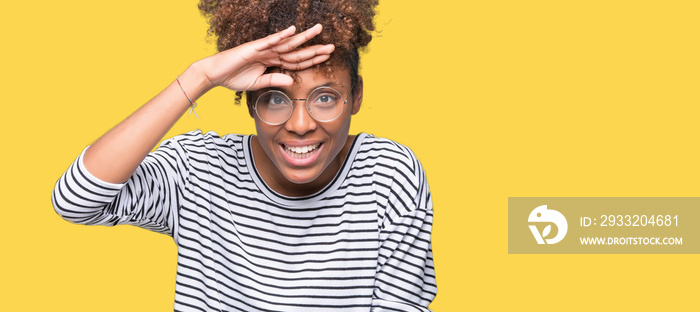 Beautiful young african american woman wearing glasses over isolated background very happy and smili