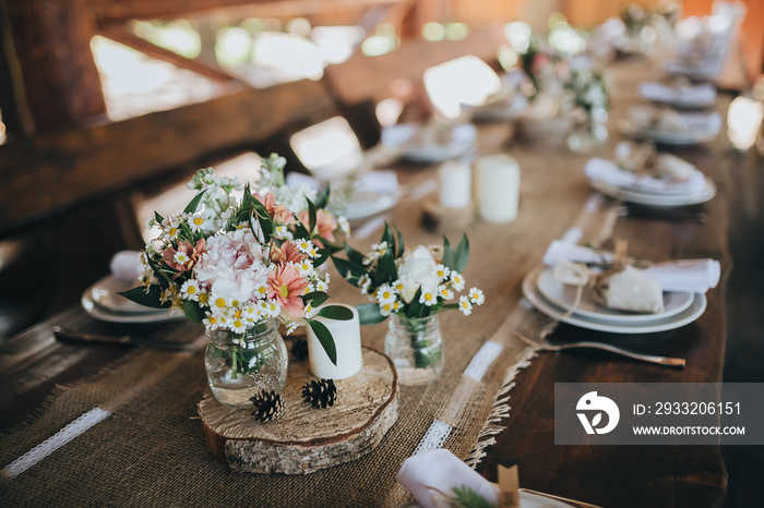 decorations made of wood and wildflowers served on the festive table