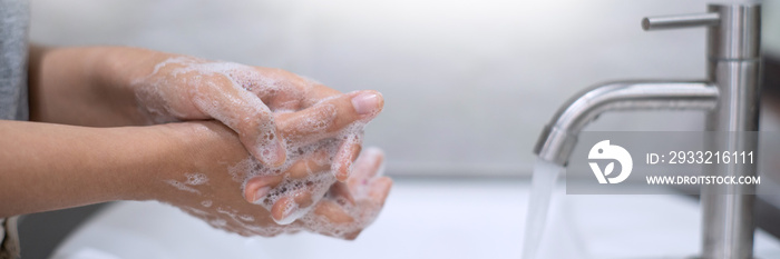 Washing hands rubbing with soap proper technique under bathroom sink for antibacterial Prevent coron