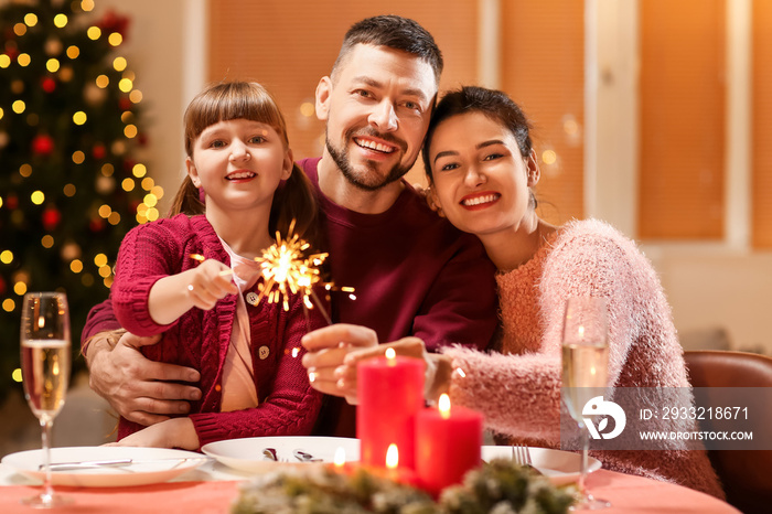 Family celebrating Christmas at home