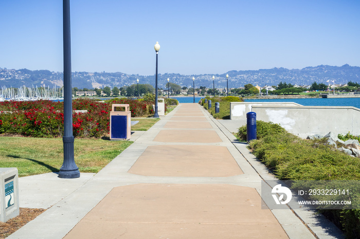 Paved walking path close to Richmond Marina, San Francisco bay trail, California