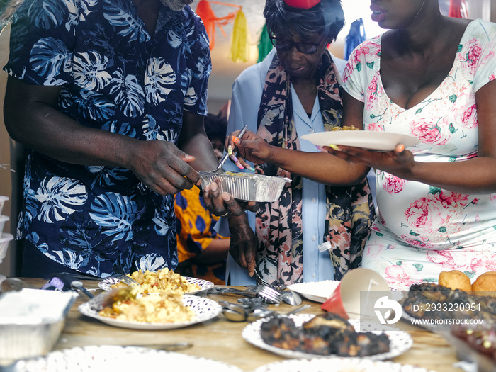 Family getting food at party