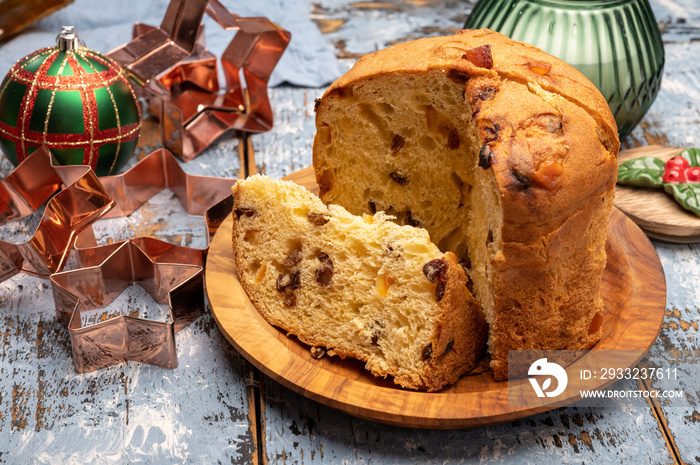 Christmas food, fresh Italian panettone cake made from yeast dough with dried fruits