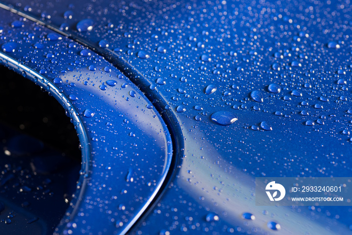 Car detailing series : Droplets on blue car bonnet