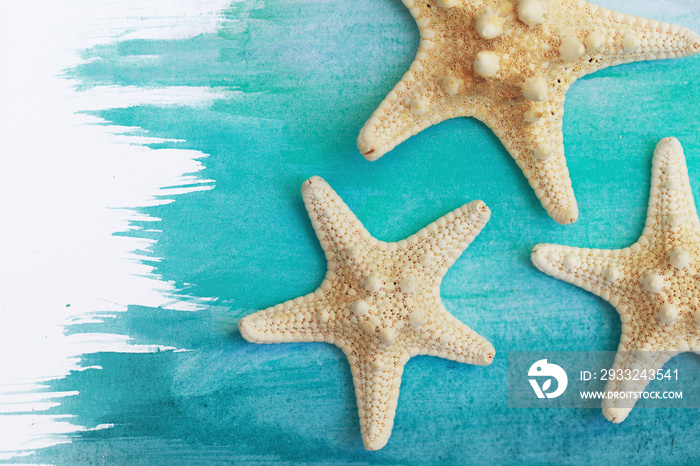 Star fish, sea star on the blue turquoise watercolor wave summer background. Flat layout