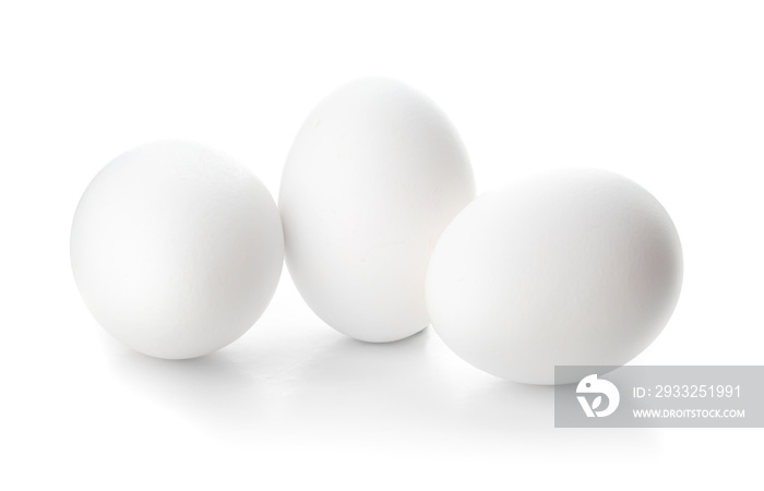 Fresh raw eggs on white background