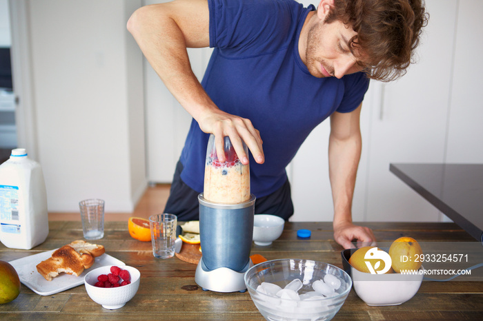 Man making smoothie