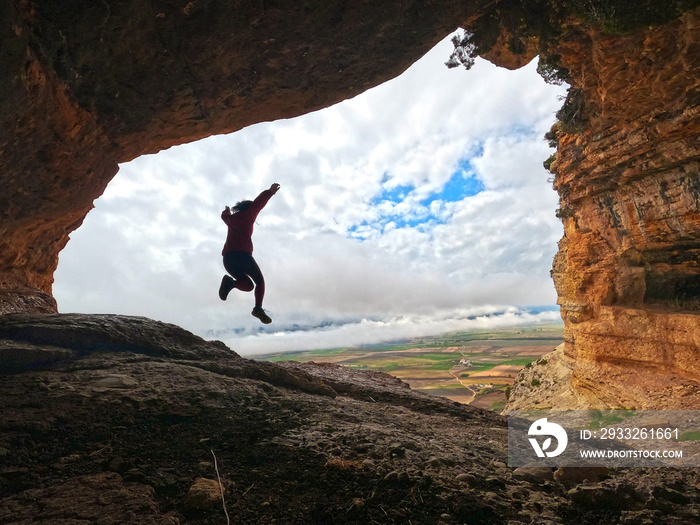 Woman hiking, walking at Cuevas de Zaen  Zaen caves  in Moratalla, Spain. Outstanging geologic desti