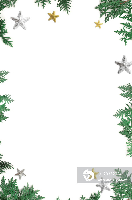 Fir branch with Christmas decorations on white background with copy space for text.