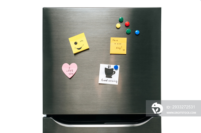 notes with wishes and magnets hanging on fridge isolated on white