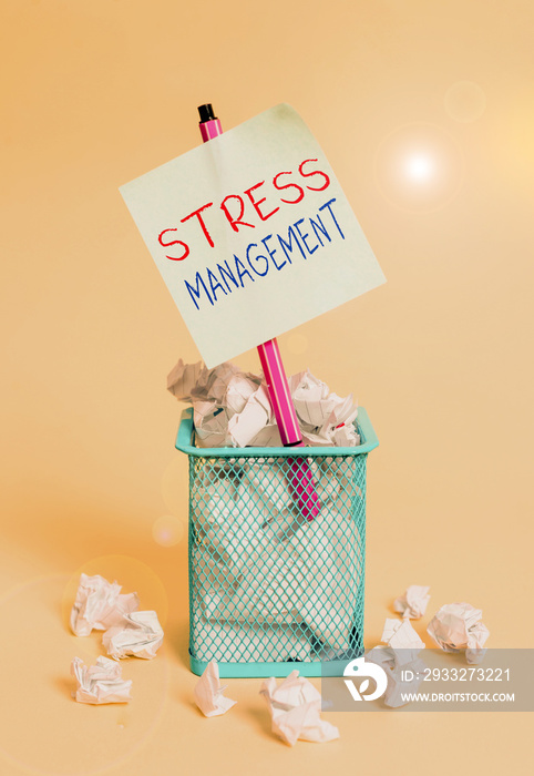 Writing note showing Stress Management. Business concept for method of limiting stress and its effec