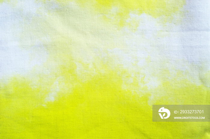 黄色水彩画抽象扎染图案笔触手绘背景。