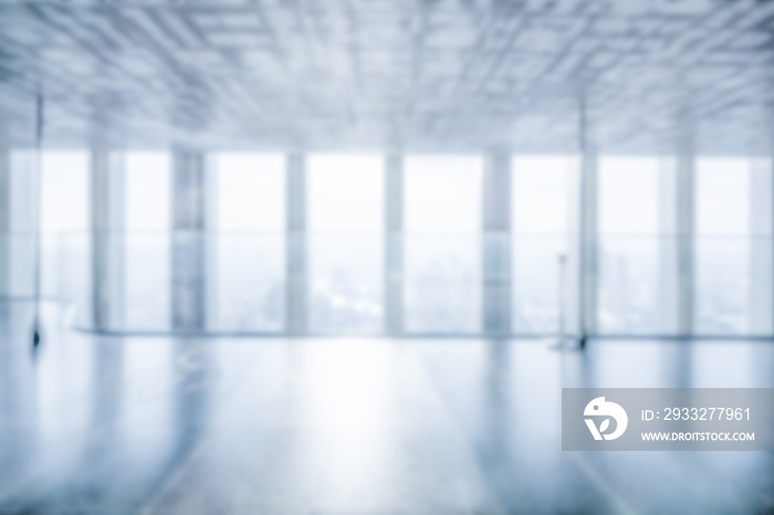 Blur background of empty office interior in city downtown. Modern workplace and conference hallway.