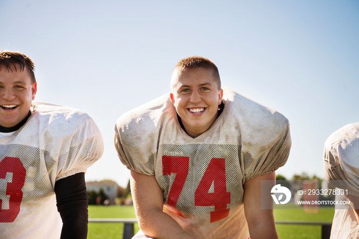 Teenage friends (14-15, 16-17) together in football team