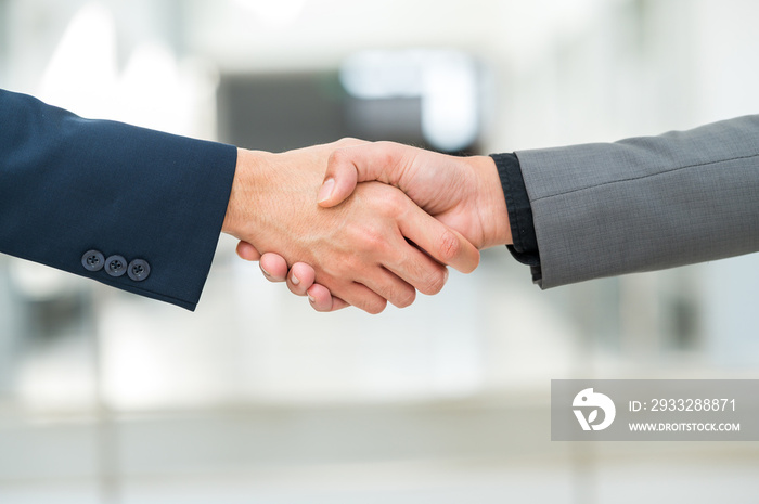 Close-up hand of Businessman handshake for teamwork of business merger partnership and business deal