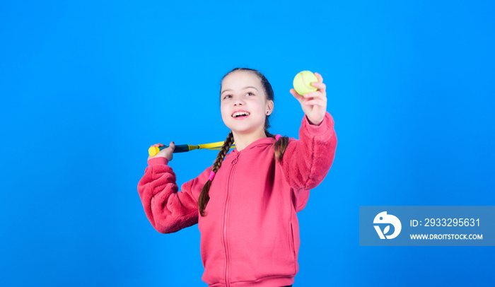 Athlete kid tennis racket on blue background. Active leisure and hobby. Tennis sport and entertainme