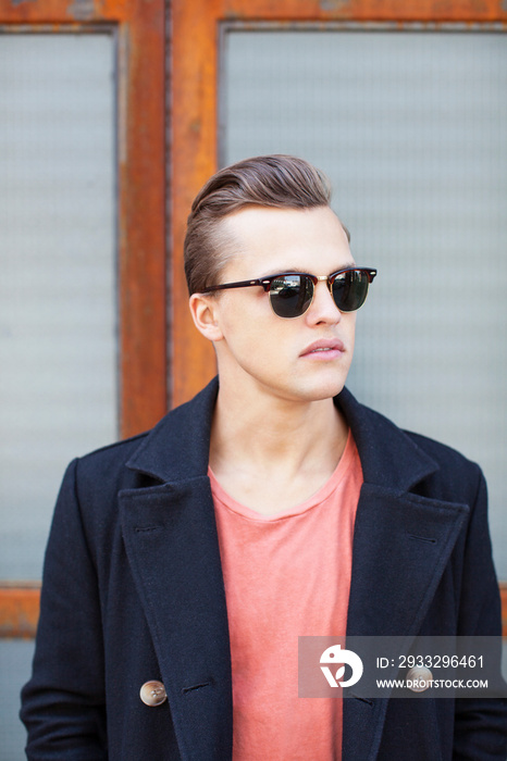 Portrait of young man wearing sunglasses