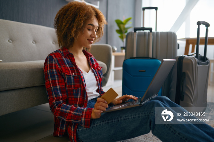 Closeup woman booking trip making purchase online