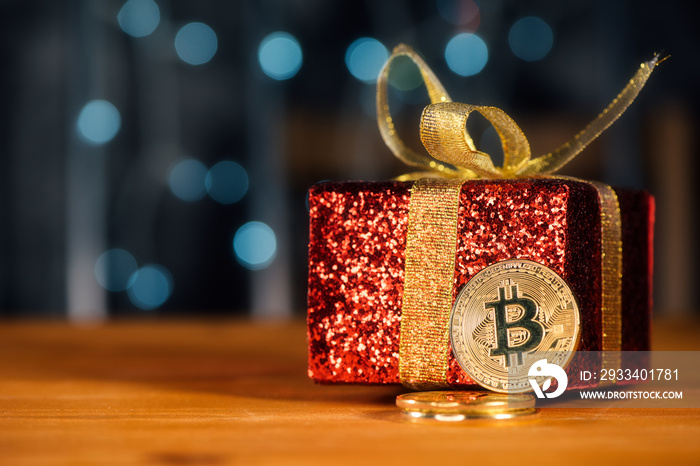 Bitcoin BTC cryptocurrency and Christmas gift box