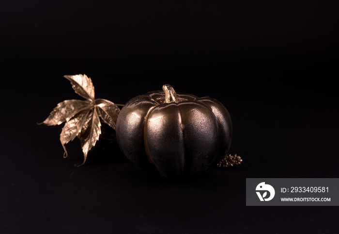 Gold and black luxury pumpkin. Minimalist banner good for thanksgiving and Halloween.