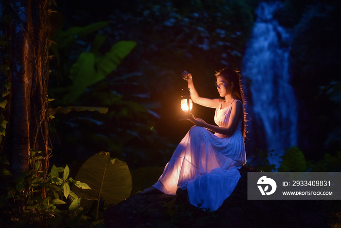 Mysterious Forest Nymph,Medieval Woman with Vintage Lantern Outside at Night ,girl holding a lamp