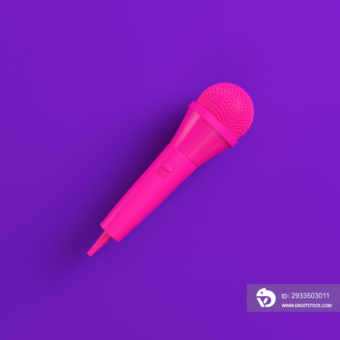 Pink microphone on purple background. Minimalism concept