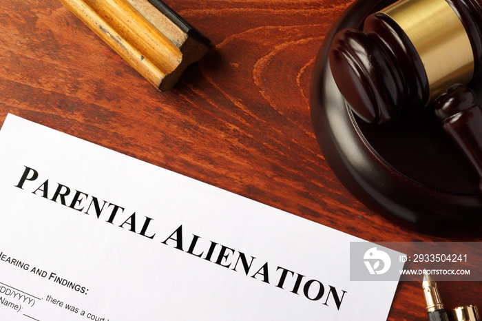 Parental alienation form and gavel on a table.