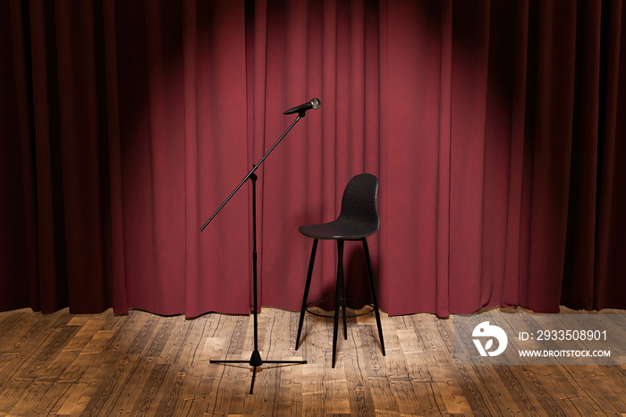 microphone and stool on a stage with curtains behind