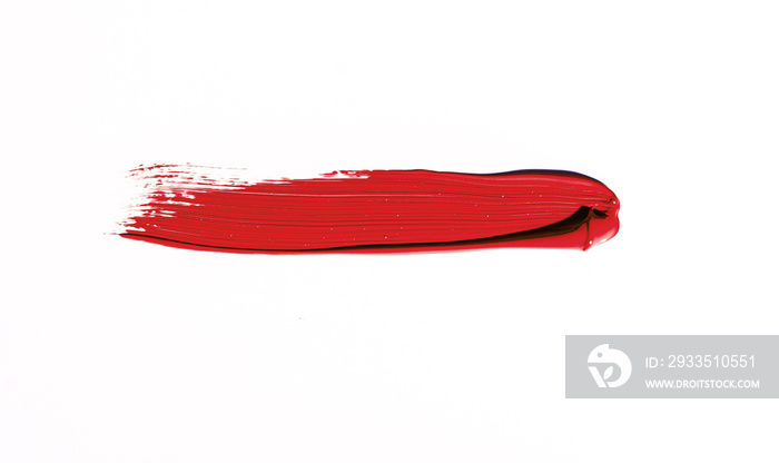 Red brush stroke isolated over white background